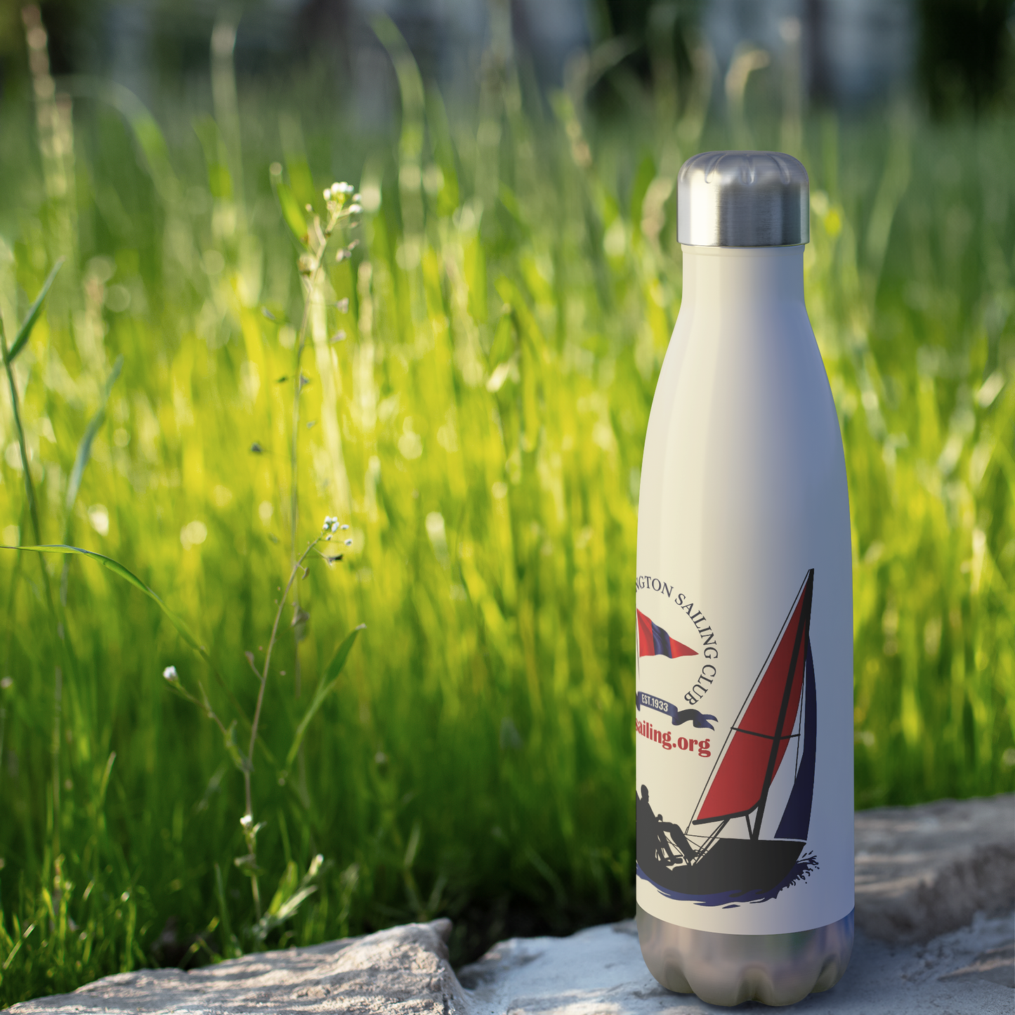 LWSC_Sailboat_Water_Bottle_WaterBottle_Outdoor_grass_Mockup.png_15928039